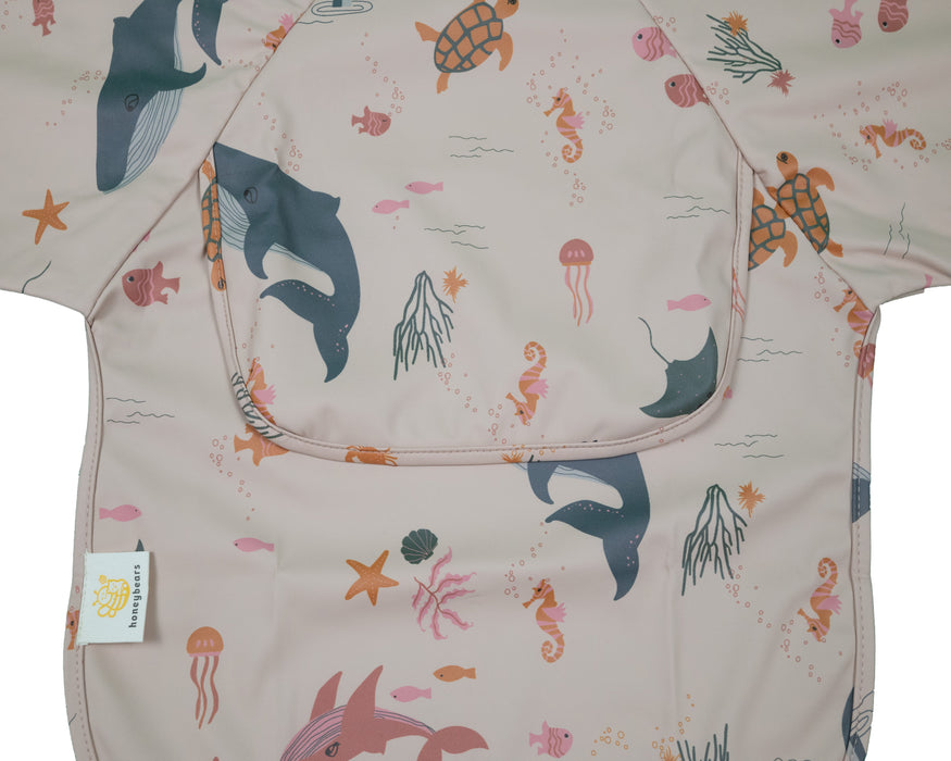 Slab met mouwen – Waterproof slabbetje met mouw – Oranje met zeedieren