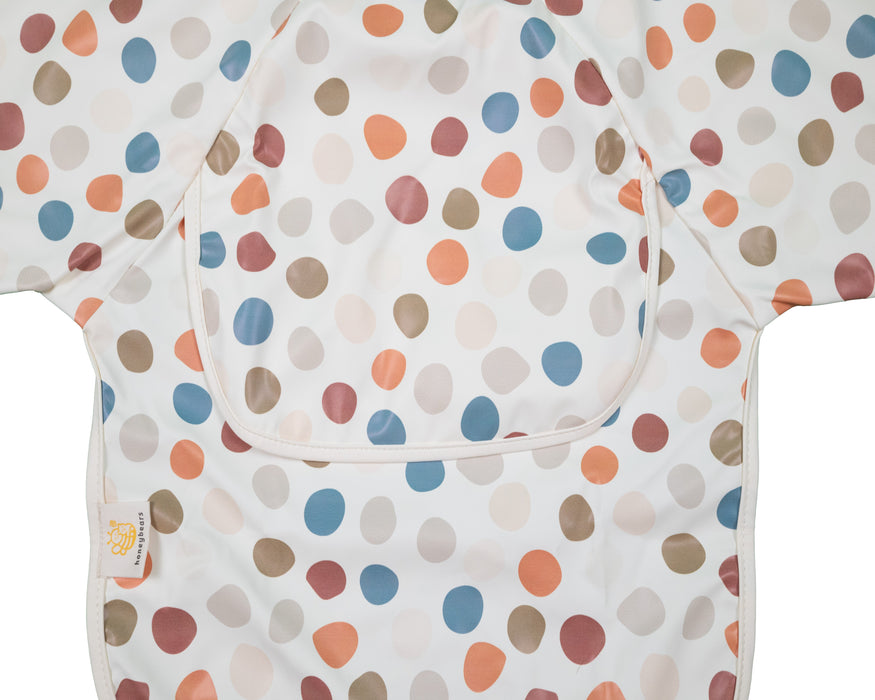 Slab met mouwen – Waterproof slabbetje met mouw – Creme met gekleurde stippen